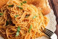 Smoky Red Pepper Pesto Pasta with Tangy Goat Cheese