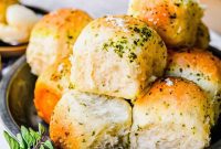 Pillowy Garlic Herb Parker House Rolls