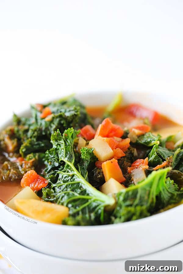 Tomato, kale, and potato soup is a perfectly hearty and healthy soup that is chock full of veggies! Ingredients for Tomato, Kale, and Potato Soup laid out on a kitchen counter, ready for cooking.