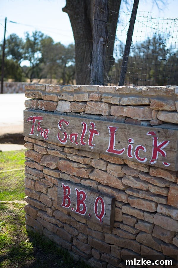 Welcome to Salt Lick BBQ The grand entrance and iconic sign of Salt Lick BBQ in Driftwood, Texas.