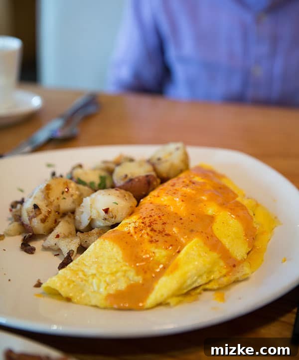 Jason's Crawfish Omelette Delight Jason's crawfish omelette with chipotle hollandaise at South Congress Cafe.