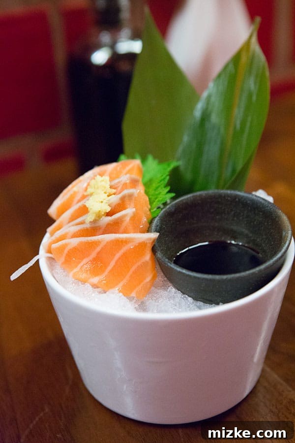 Uchiko Appetizer Detail A small, artfully arranged Japanese appetizer or snack from Uchiko.