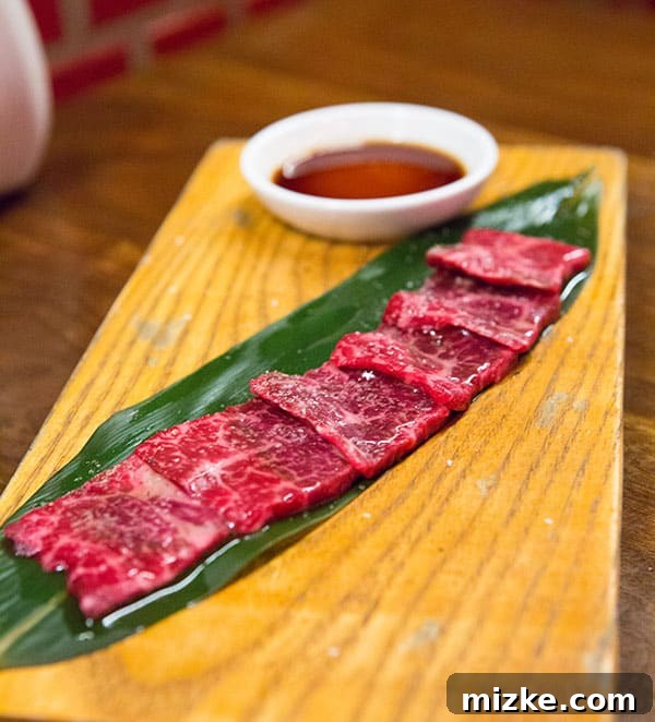 Uchiko Seared Dish A dish of perfectly seared fish or meat with a delicate sauce at Uchiko.