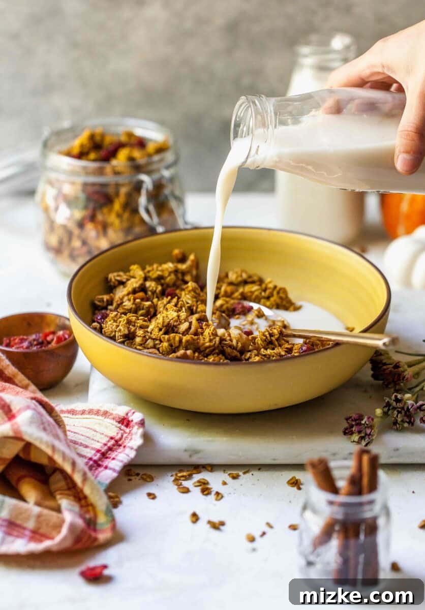 Spiced Pumpkin Cranberry Crunch 6 The final batch of Pumpkin Cranberry Granola, beautifully golden brown with visible cranberries and nuts.