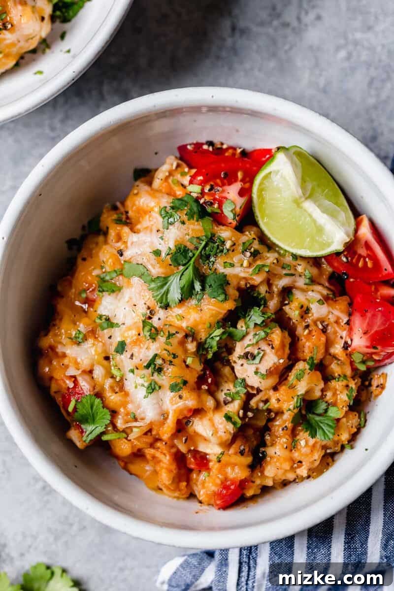Fiesta Chicken Rice Bake 4 Bold flavors of Tex-Mex cuisine combined in this classic chicken and rice casserole make for an easy choice for weeknight dinner!