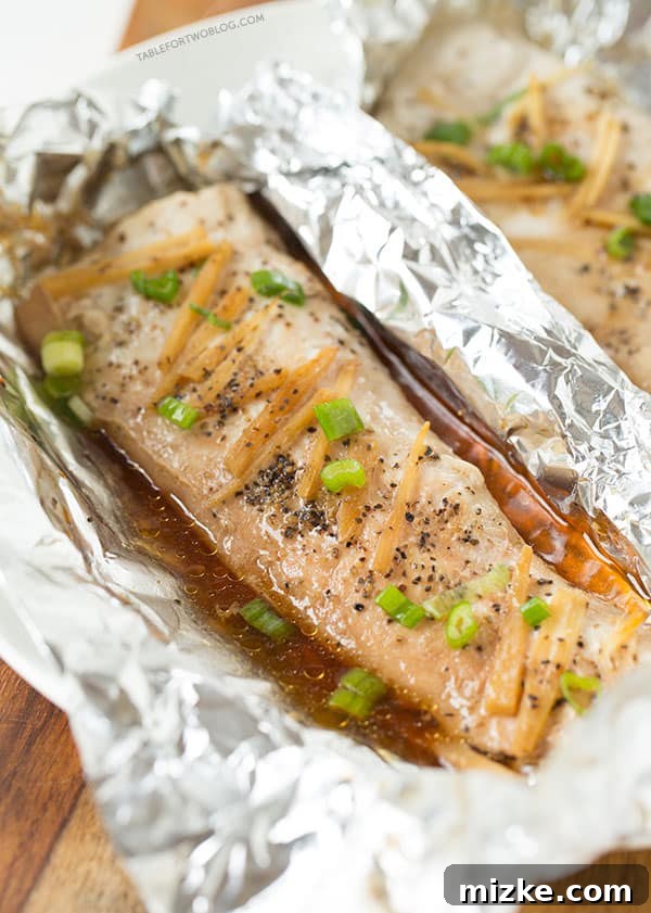 Fresh fish fillets for Ginger Soy Sesame Fish in a Pouch Fresh white fish fillets, ready to be seasoned for an easy Ginger Soy Sesame Fish in a Pouch recipe.
