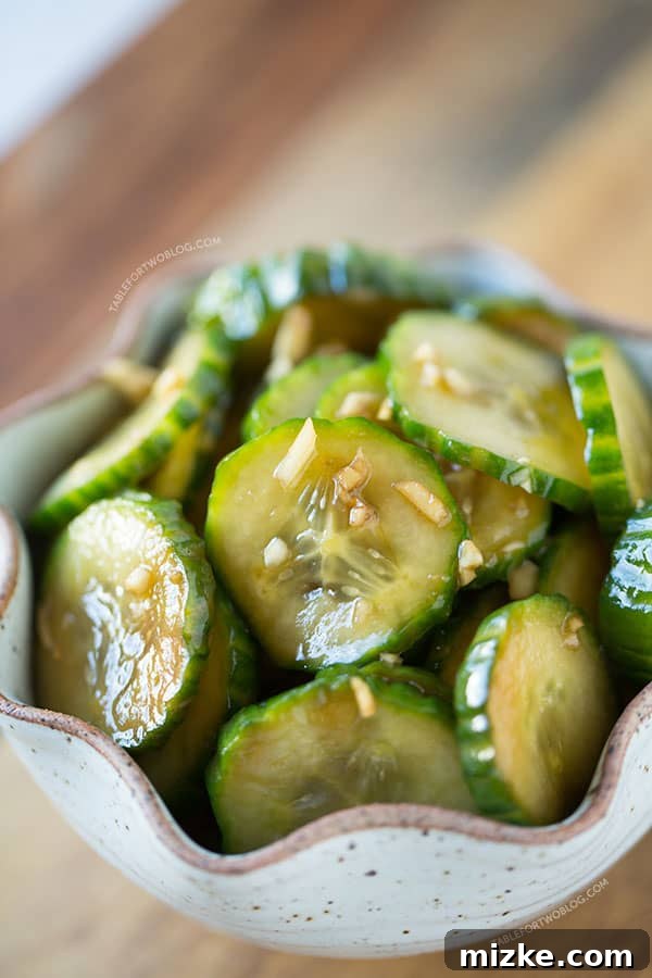 Umami Garlic Cucumbers 2 Crisp chilled garlic soy cucumbers, a vibrant and refreshing snack for a hot day