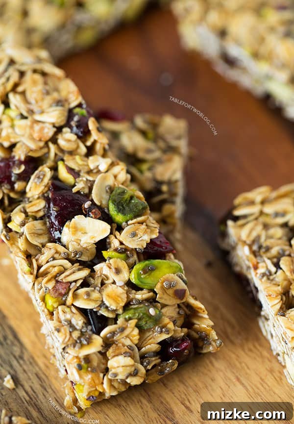 Wholesome Cranberry Pistachio Energy Bars 2 Make a batch of these cranberry pistachio granola bars to take as a snack to the beach, pool, or even plane ride for happy campers while traveling!