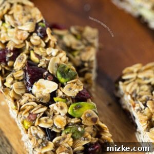 Final Cranberry Pistachio Granola Bars in a stack.