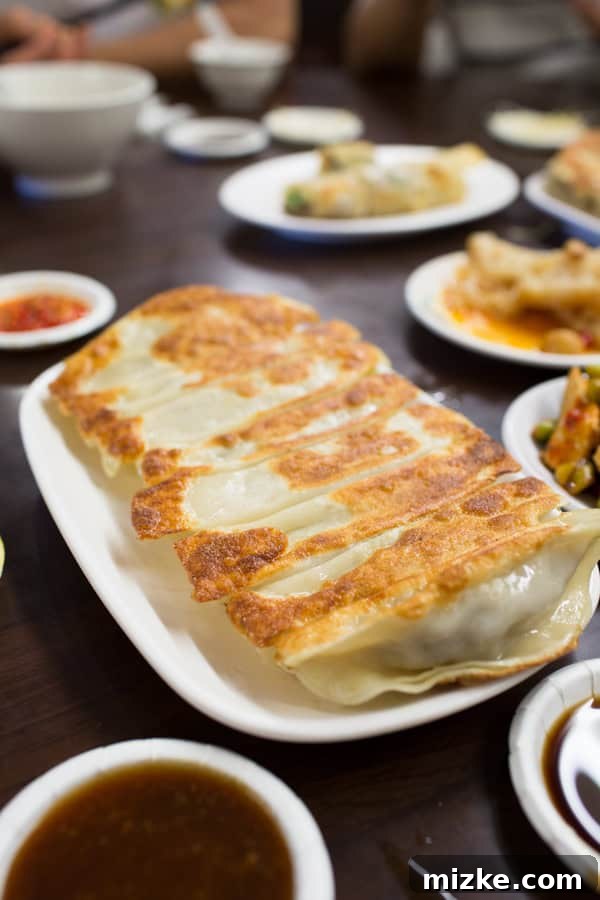 Crispy pan-fried potstickers, golden brown and delicious