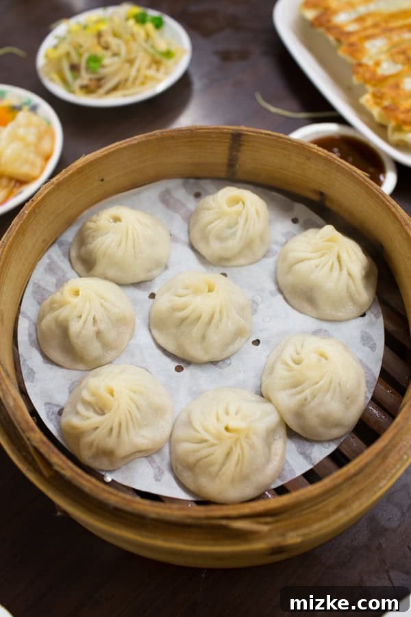 Steaming basket of traditional Taiwanese soup dumplings (Xiaolongbao)