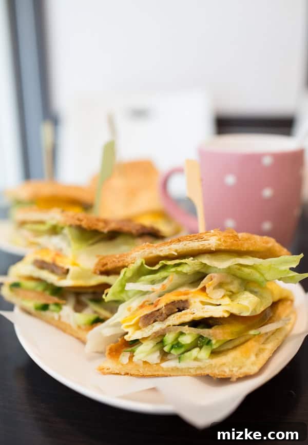 Taipei breakfast sandwich with flaky bun, egg, and ham