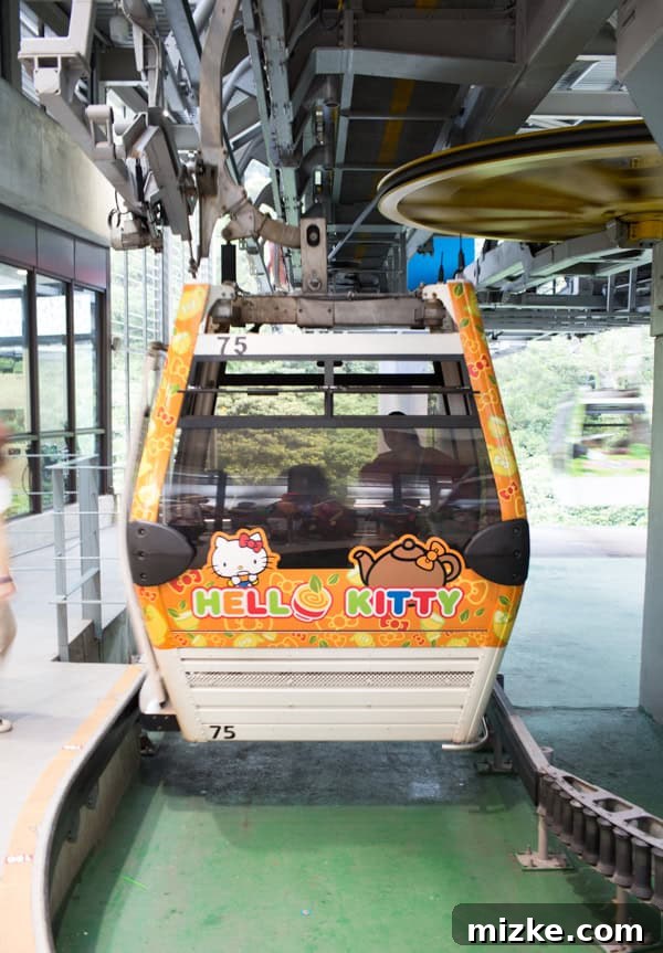 Maokong Gondola cabin ascending over lush green hills of Taipei