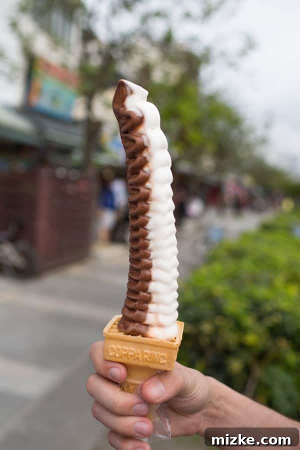 Incredibly tall soft-serve ice cream cone, a popular street treat in Danshui