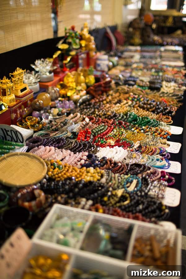 Stalls at Jianguo Holiday Flower Market with various plants and flowers