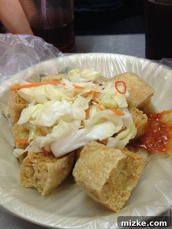 A Culinary Adventure with Stinky Tofu in Taipei Trying Stinky Tofu in Taipei, Taiwan