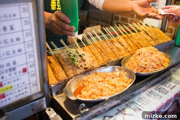Street Food: Grilled Tofu Skewers in Shenkeng Grilled Tofu on a Stick from a Shenkeng Street Vendor