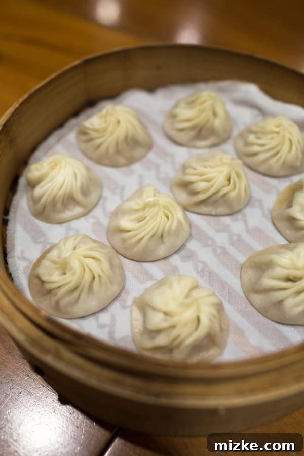 Perfectly Crafted Soup Dumplings at Din Tai Fung Steaming Hot Xiaolongbao Served at Din Tai Fung