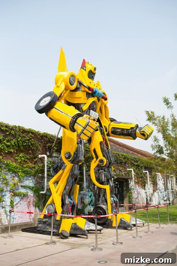 Kaohsiung: Taiwan's Vibrant Southern Hub 18 Large, yellow robot sculpture resembling Bumblebee from Transformers at Pier 2 Arts Center, a prominent art piece