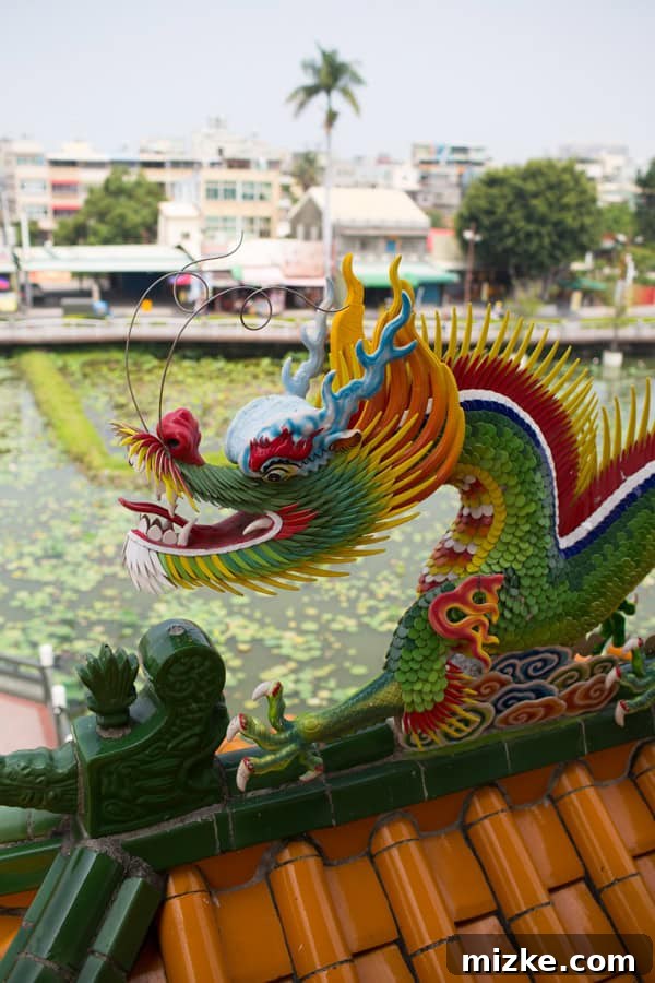 Kaohsiung: Taiwan's Vibrant Southern Hub 6 Detailed view of the intricate architecture and vibrant colors of a traditional Taiwanese pagoda at Lotus Lake