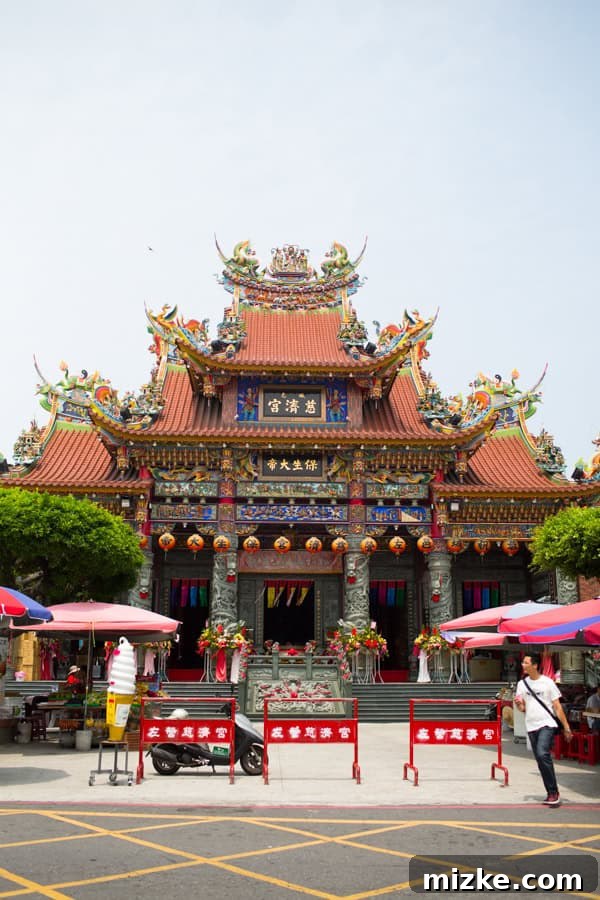 Kaohsiung: Taiwan's Vibrant Southern Hub 9 Exquisite intricate details of a traditional Taiwanese temple roof and carvings, reflecting ancient craft