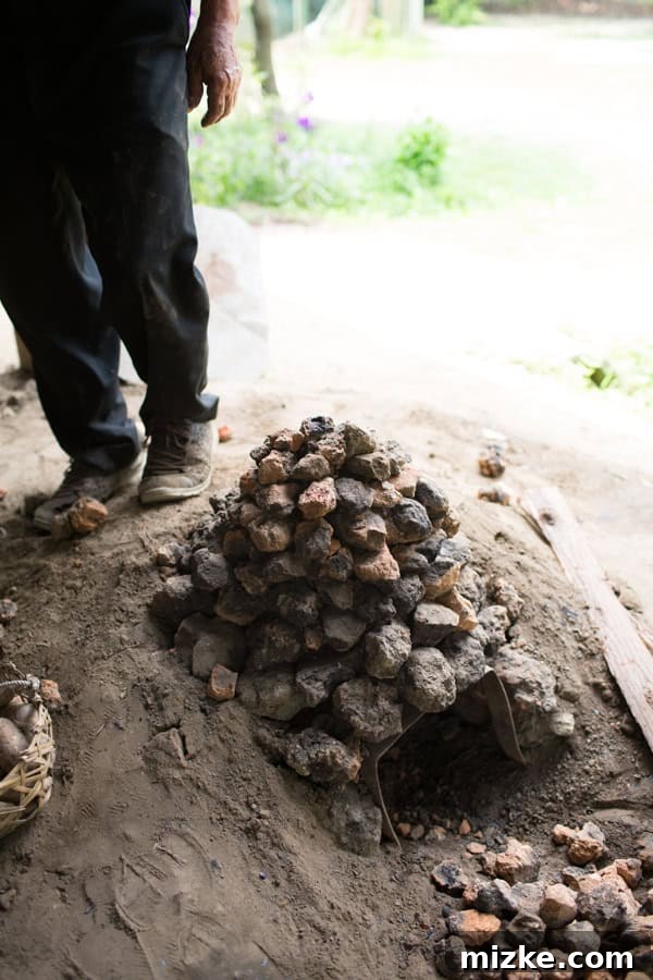 Hsinchu: Taiwan's Innovation Nexus 14 Placing pieces of wood under the rock structure to start the fire for heating.