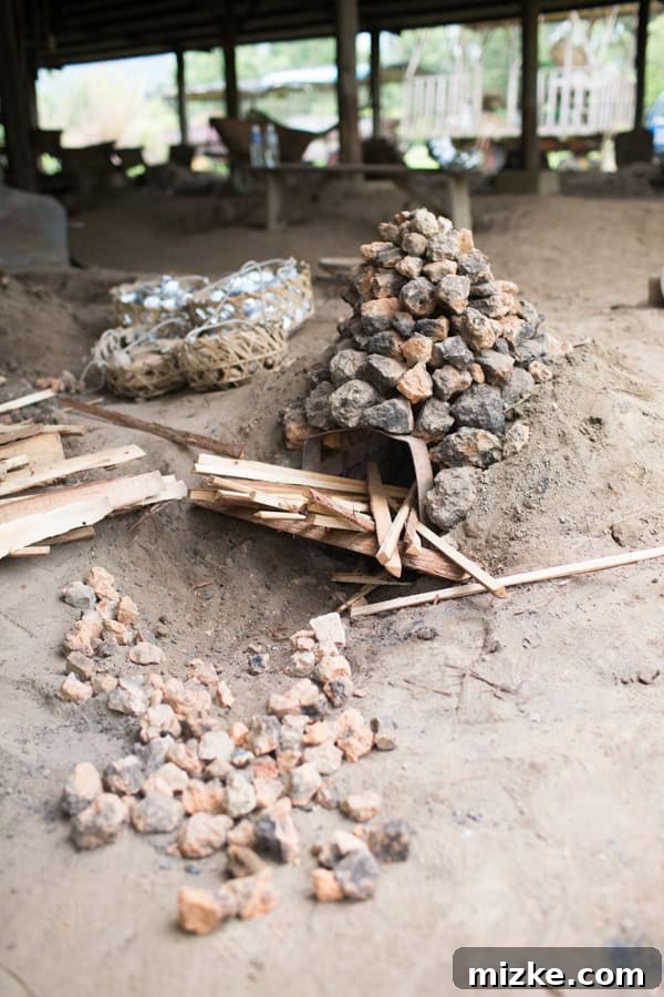 Hsinchu: Taiwan's Innovation Nexus 15 Lighting the wood under the rock structure, initiating the heating process.