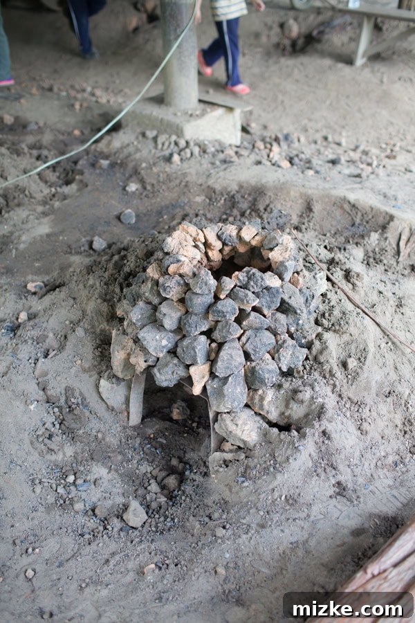 Hsinchu: Taiwan's Innovation Nexus 10 Continuing to build the rock structure, creating a chamber for the fire.