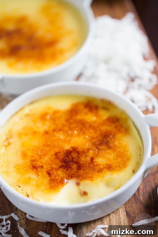 Paradise Coconut Creme Brulee 4 Four individual ramekins filled with the luscious Coconut Crème Brûlée custard, cooling gracefully.