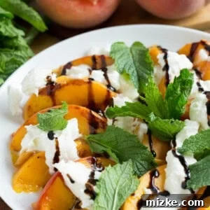 Grilled peaches with burrata, mint, and balsamic drizzle is a super easy summer appetizer that you'll want to have all summer long!