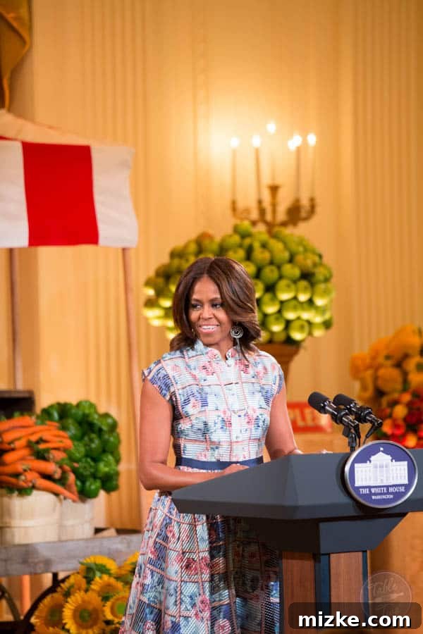 2014 White House Junior State Dinner 18 First Lady Michelle Obama listening to Braeden Mannering
