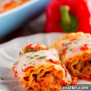 Gourmet Chicken and Roasted Red Pepper Lasagna Pinwheels 5 Roasted red pepper chicken lasagna rolls are a flavorful and fun twist on the classic way lasagna! Give these rolls a try!