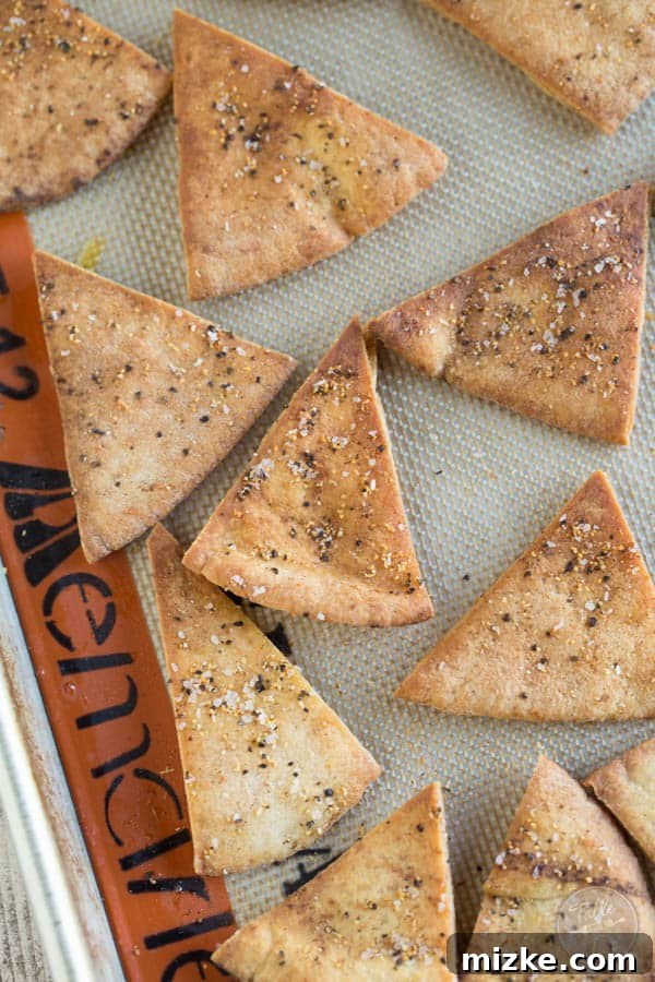 Flavorful Homemade Pita Crisps 2 Homemade seasoned pita chips are so easy to make and perfect to pair with your favorite dip! Make these for your next game day or television binge day!