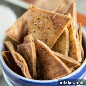 Homemade seasoned pita chips are so easy to make and perfect to pair with your favorite dip and favorite game on TV!