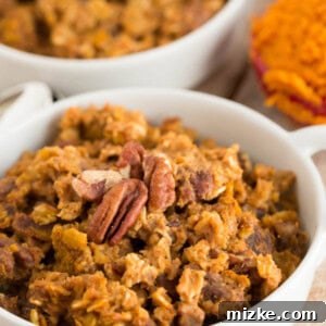 The perfect Fall breakfast for a crowd! This pumpkin spice baked oatmeal has just the right amount of pumpkin & oats to give your breakfast that Fall flair!