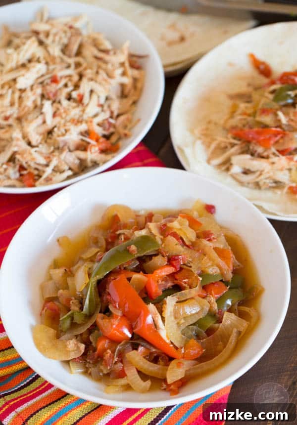 Effortless Slow Cooker Chicken Fajitas 4 The easiest, no-effort, slow cooker dish ever! Slow cooker chicken fajitas are the PERFECT weeknight meal!!