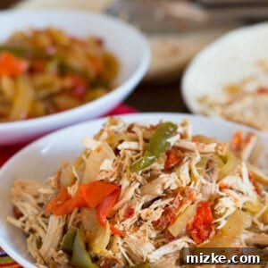 The easiest, no-effort, slow cooker dish ever! Slow cooker chicken fajitas are the PERFECT weeknight meal!!