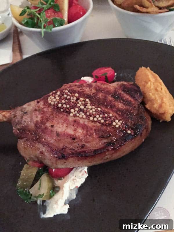 Nopi Main Course: Exquisite Flavors Main course dish at Nopi, highlighting a creative blend of flavors