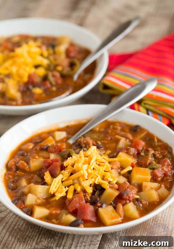 Hearty Chorizo Potato and Double Bean Crockpot Chili 2 A vibrant and hearty slow cooker chorizo, potato, and two-bean chili, perfect for a warming meal on a cold evening.