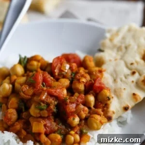 If you love Indian flavors, chana masala is a quick and easy way to enjoy this flavorful, warm, and hearty classic Indian dish!
