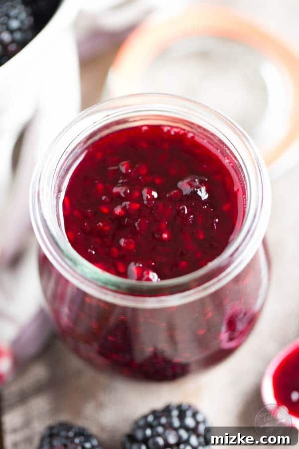 Zesty Blackberry Lemon Preserve 3 Close-up of fresh, ripe blackberries and bright yellow lemons, the essential ingredients for creating this exquisite homemade jam.