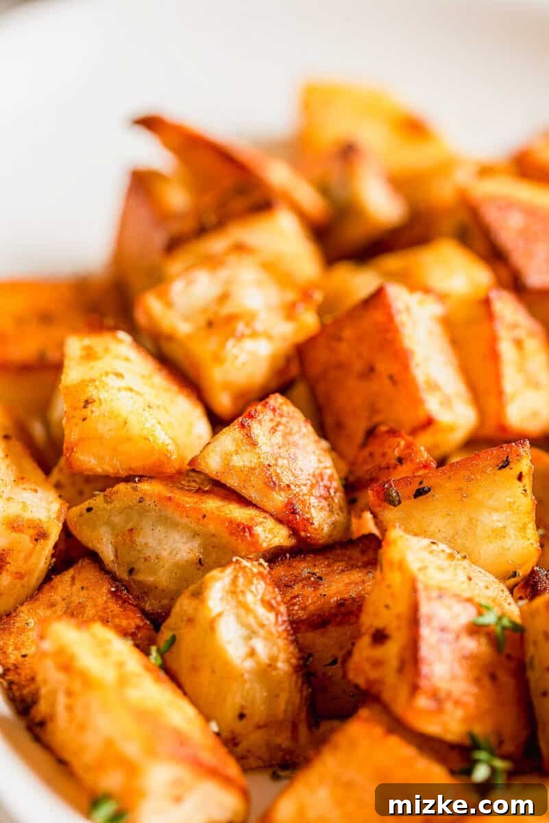 Roasted Potato Perfection 5 up close image of roasted potatoes and their crispy exterior, highlighting the perfect texture