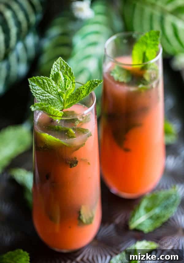 Tropical Guava Mojito Twist 2 Guava mojitos that will transport you to paradise! A great cocktail to drink for whenever you're lusting for the beach and white sand!
