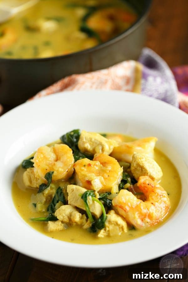 Tropical Garlic Coconut Curry Shrimp and Chicken Bowl 2 This garlic coconut curry shrimp bowl is bursting with rich flavor and paleo-friendly! You'll love the crispy exterior of the shrimp in the creamy and hearty soup!