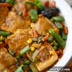 Mom's Sunday Stuffed Tofu 5 Stuffed Tofu with savory pork filling and rich sauce.
