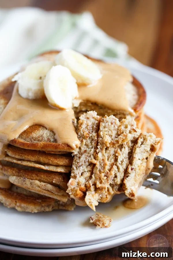 Nutty Gluten Free Cashew Butter Pancakes for Two 4 Close-up of golden Paleo Cashew Butter Pancakes, a perfect gluten-free breakfast for two.