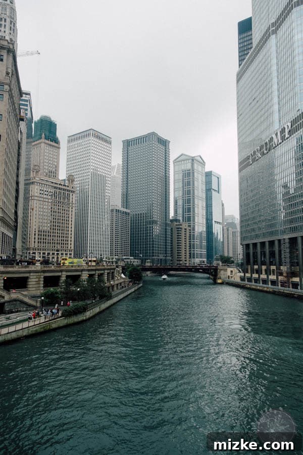Unforgettable Chicago Experiences 4 Architectural buildings lining the Chicago Riverwalk on a cloudy day
