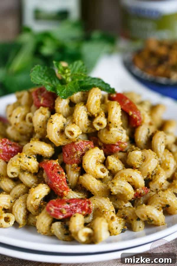 Pistachio mint pesto pasta will make you wonder where it has been all your life and it will be the only pesto you want to make! Less than 30 minutes gets this flavorful pasta dish on your dinner table! #sponsored
