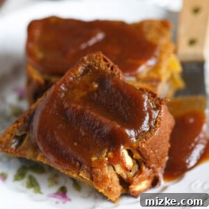 A beautifully textured image of Slow Cooker Bourbon Apple Butter, ready to be savored, perfect for fall baking and spreading.