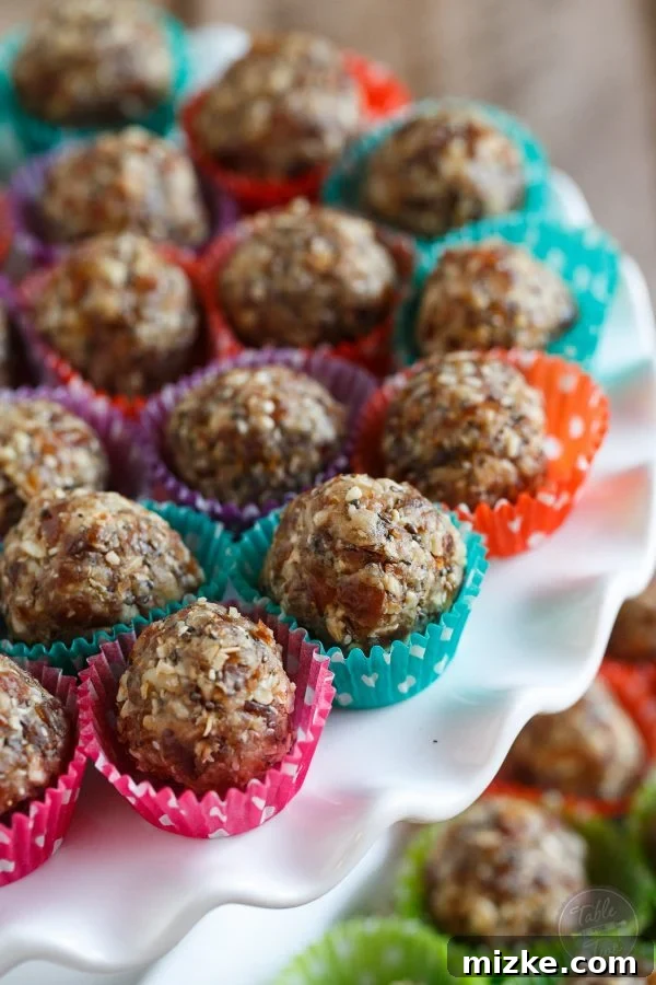 Glow Bites 3 Freshly made energy ball bites, a healthy and quick snack, arranged on a serving platter.